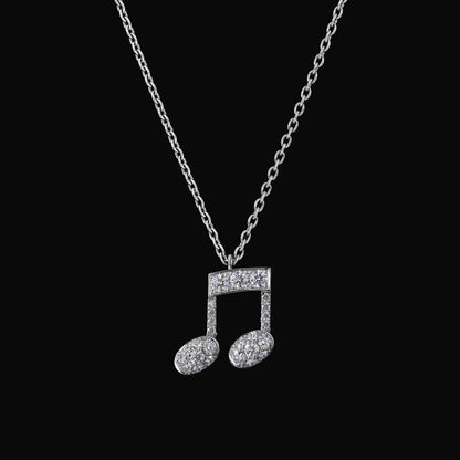 Diamond beamed eighth note pave pendant