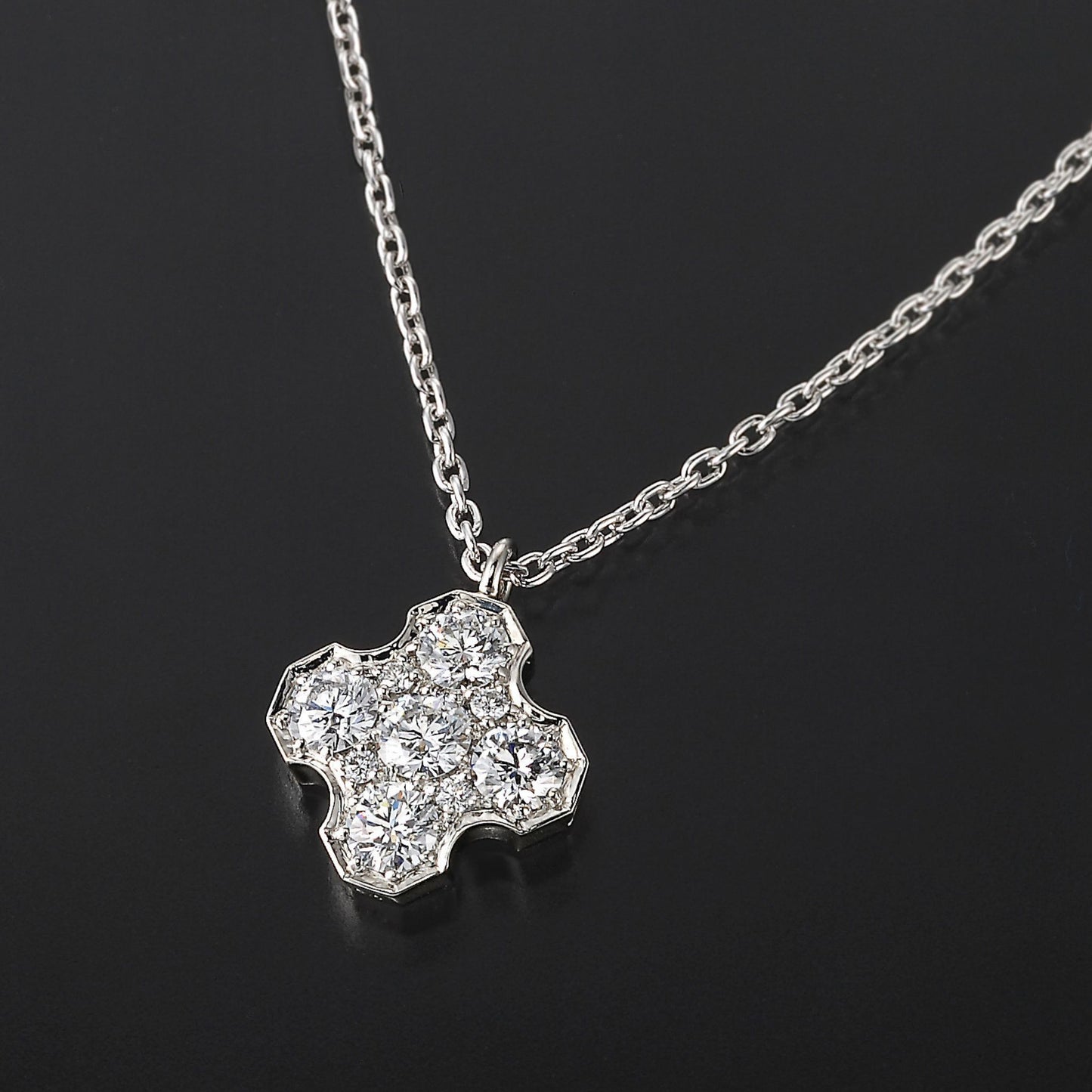 Diamond symmetry cross pendant 0.8ct